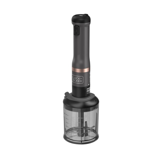 A BLACK+DECKER hand blender with a black handle and transparent mixing container. The container has measurement markings and contains blades for blending or chopping.