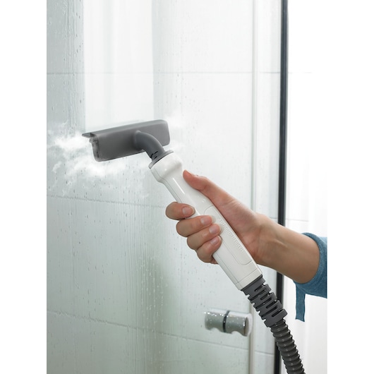 BLACKDECKER BHSM1610DSM steam cleaner handheld nozzle cleaning glass shower door.