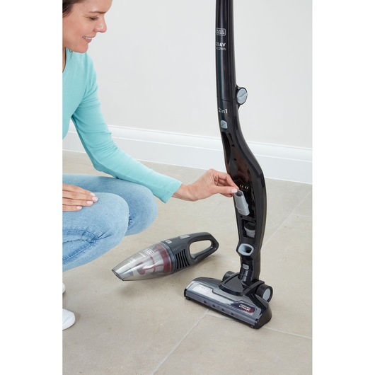 BLACKDECKER SVB620JW 2-in-1 stick vacuum with detachable handheld unit shown on tile floor, side angle.