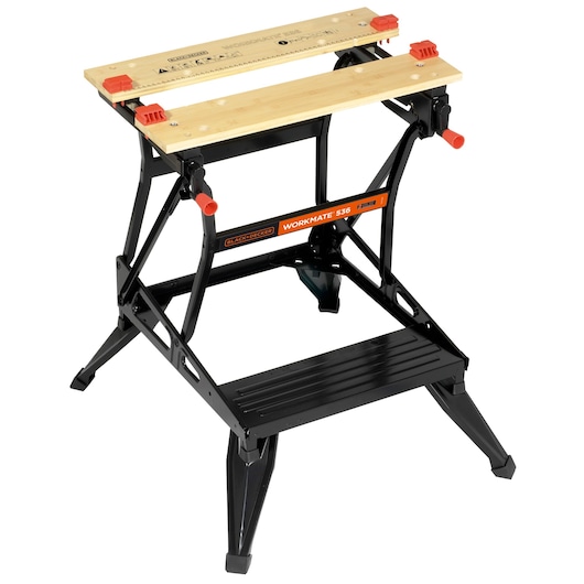 A BLACK+DECKER Workmate 536 portable workbench with a folding black metal frame and two wooden clamping surfaces. The orange label is visible on the front, and there are red adjustment handles and feet for stability.